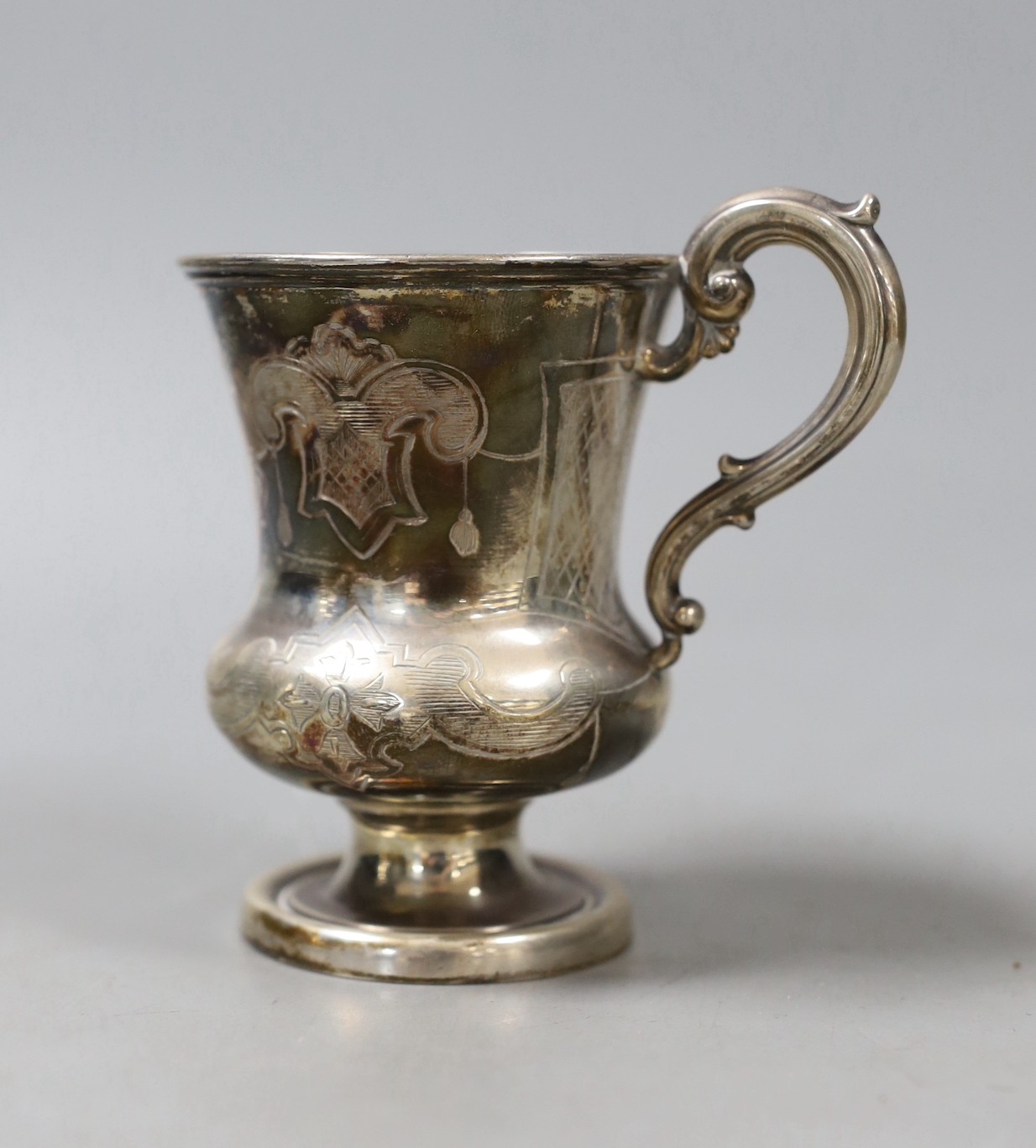 A Victorian urn shaped silver christening mug by Henry Wilkinson & Co, Sheffield, 1853, 10.5cm, 123 grams.
